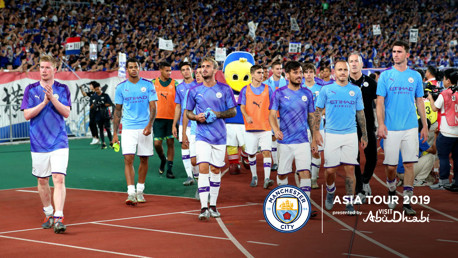 LAP OF HONOUR: City salute fans in Yokohama.