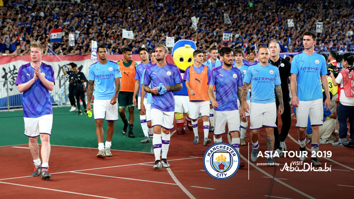 LAP OF HONOUR: City salute fans in Yokohama.