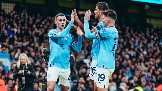 HIGH FIVES: Foden feels the love.