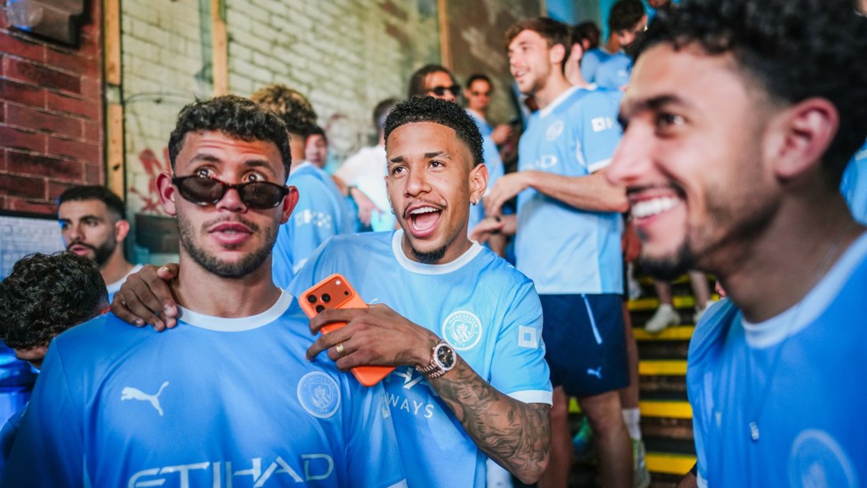 RARING TO GO : Nunes, Savinho and Marmoush line up for the bus