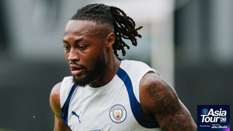 A Manchester City player in training gear during the Asia Tour '26, presented by Experience Abu Dhabi.