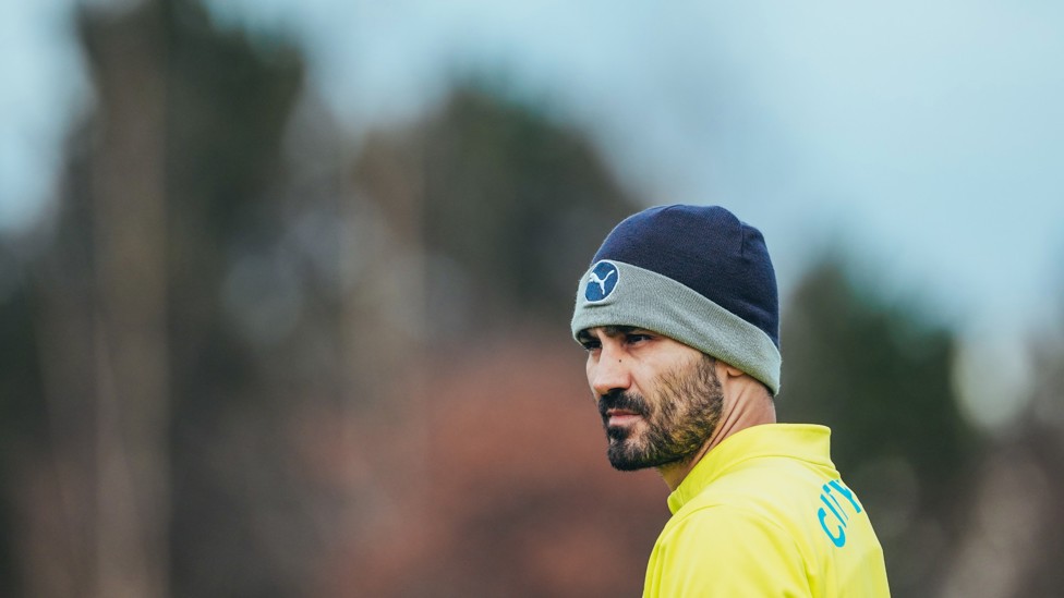 WRAPPED UP WARM : Ilkay Gundogan keeps cosy