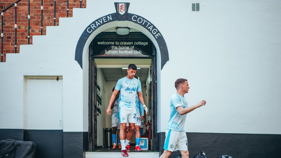 HEADING OUT  : Sergio Gomes and Matheus Nunes make their way onto the pitch.