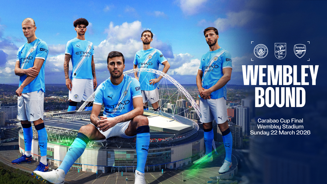 Manchester City players in blue jerseys standing in front of Wembley Stadium, advertising their match against Arsenal in the Carabao Cup Final on March 22, 2026.