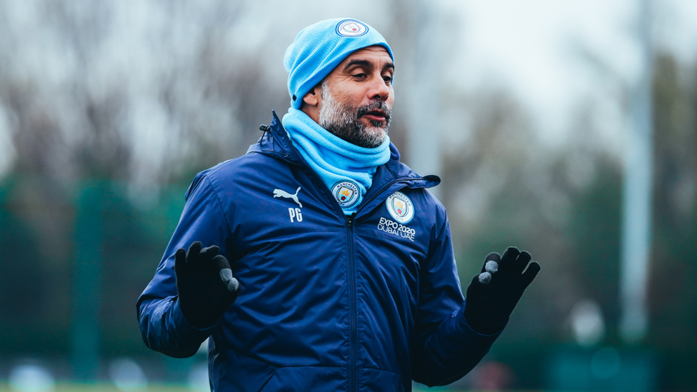 BOSSING IT : Pep Guardiola hands out some instructions.