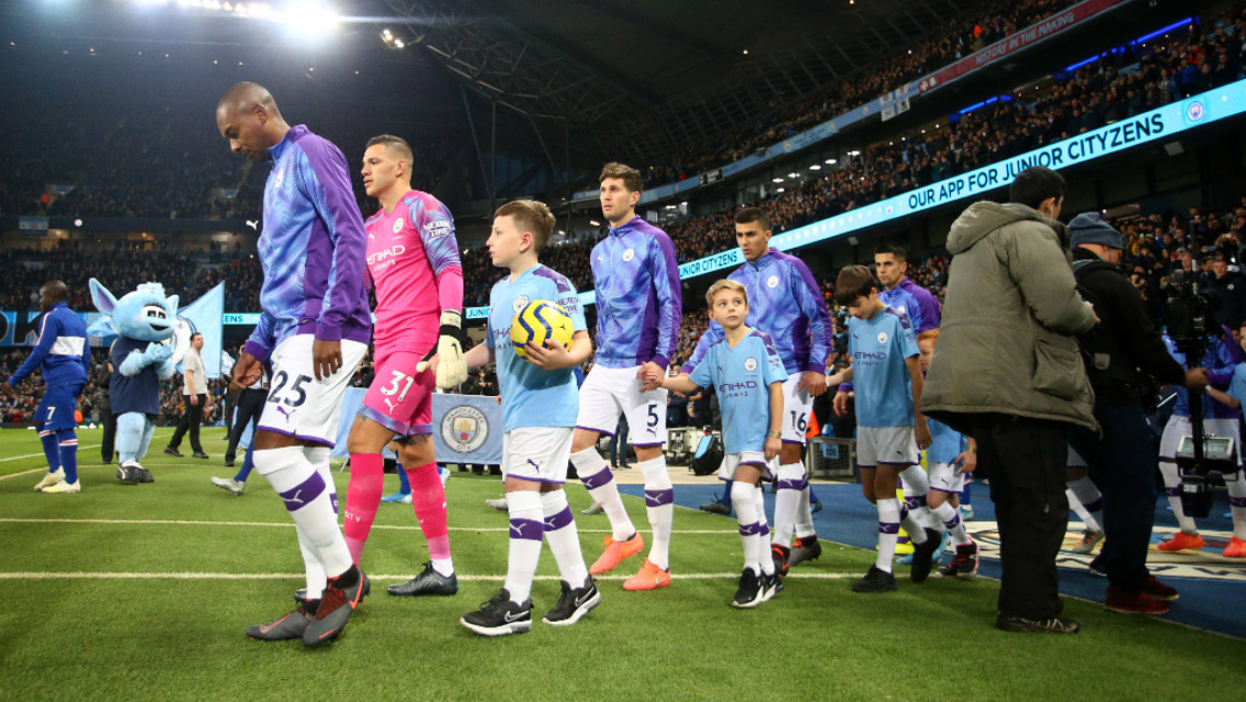 NIGHT UNDER THE LIGHTS: The two sides emerge to a wall of noise and sea of blue