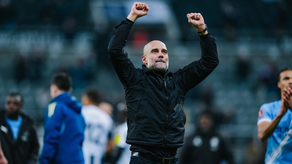 HUGE CELEBRATIONS: Pep Guardiola fist pumps as we secure passage into the quarter-finals 