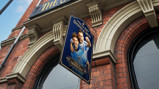 A pub sign titled 'Stones & Silva' featuring two footballers in Manchester City jerseys with the text 'Over 18 Trophies Only'.