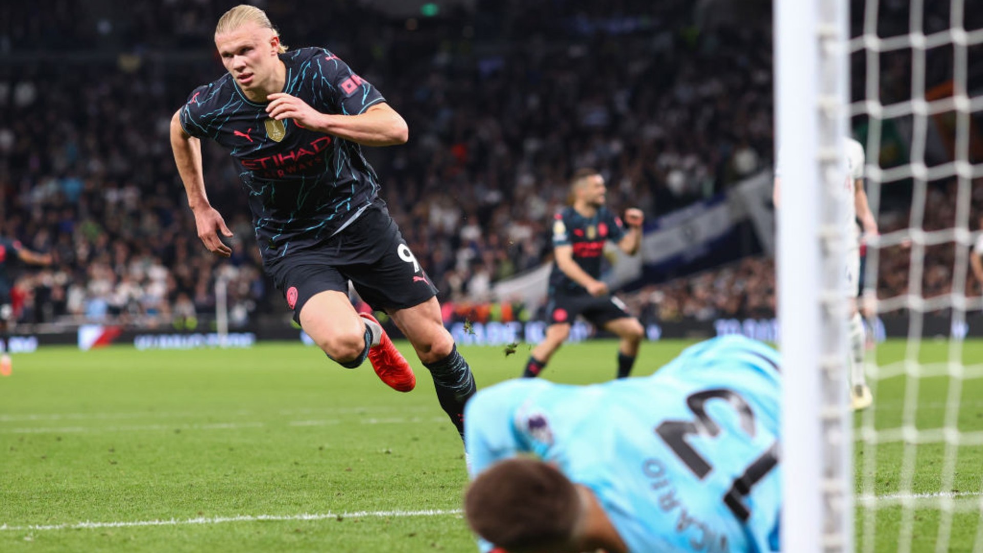 SPOT ON: Erling Haaland wheels away in delight after sealing a huge victory.