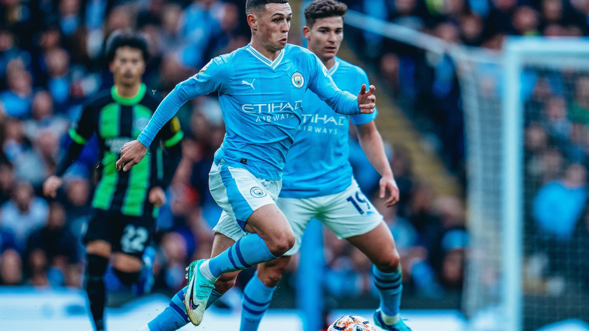 DRIVING FORCE: Phil Foden in the thick of the action for City.