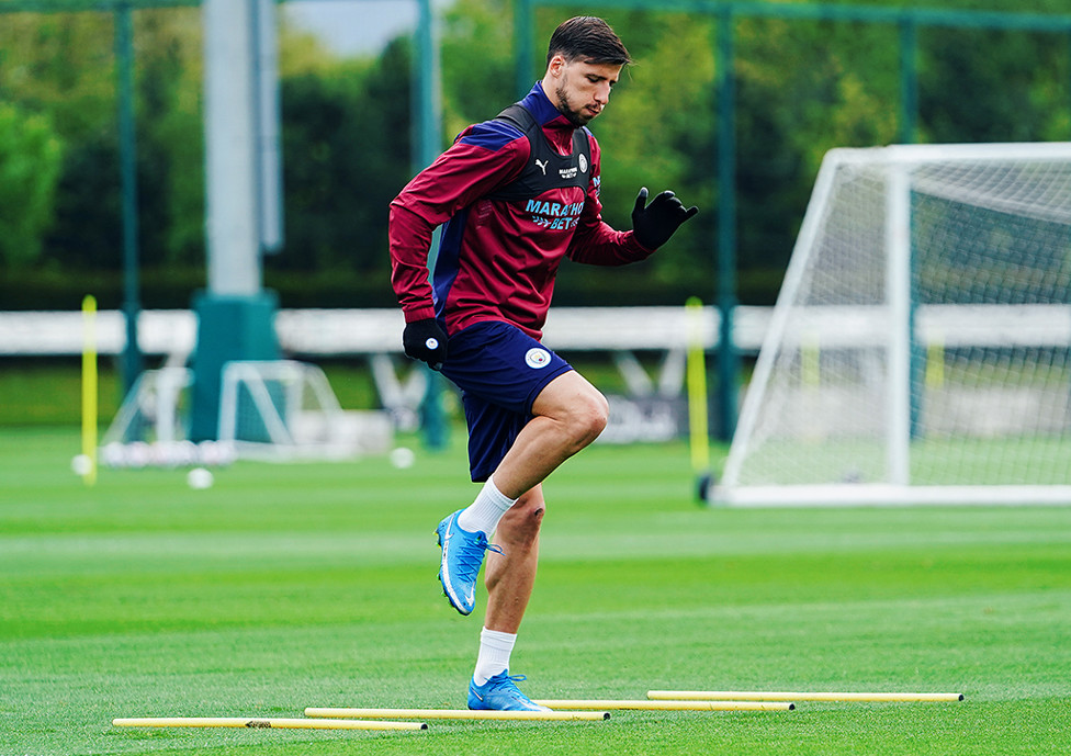 ROCKIN' RUBEN: Ruben Dias makes his way through the ladders