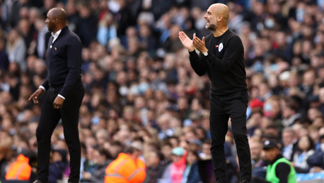 PEP TALK: The boss passes on encouragement from the touchline.