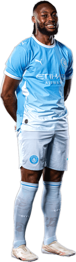 A person wearing a Manchester City football kit, consisting of a light blue jersey with 'Etihad Airways' sponsor logo, shorts with Manchester City logo, and football boots.