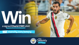Promotion for a chance to win a signed Manchester City Cherki CWC shirt. Visit the website for details.