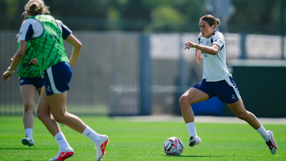DRIVING FORCE  : Grace Clinton brings the ball forward. 