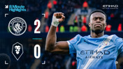 The score of the match is Manchester City 2, Salford City 0, with Manchester City player celebrating.