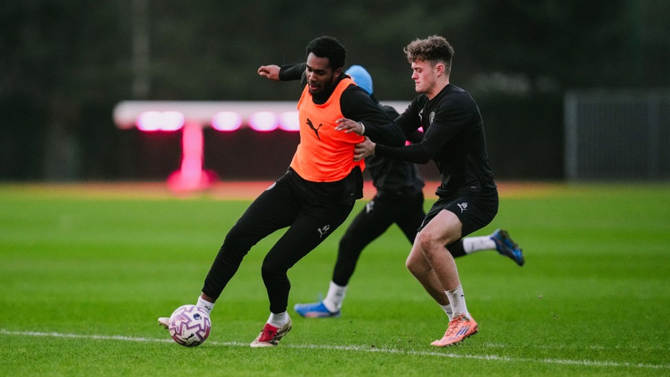 STRONG BATTLE  : Isaiah Dada-Mascoll holds off Matty Warhurst.