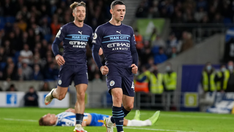 CELEBRATE: Foden wheels away to celebrate scoring City's second goal.