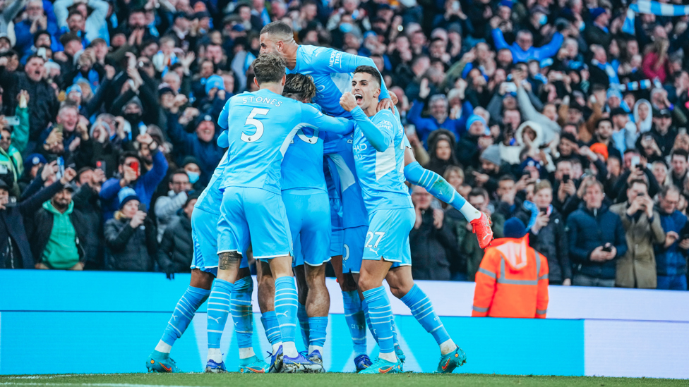 SHARING THE LOVE : The players celebrate with Mahrez.
