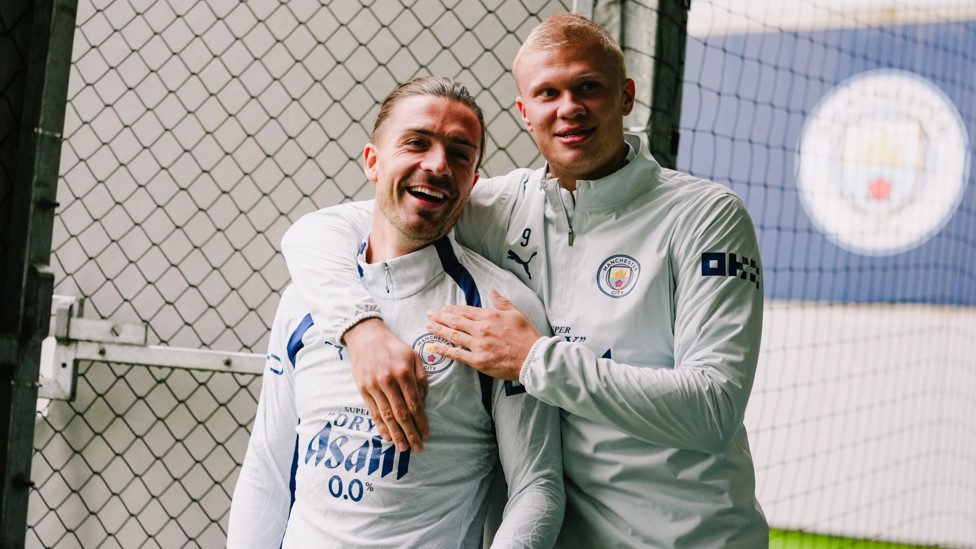 BIG SMILES : Jack Grealish and Erling Haaland on their way to training