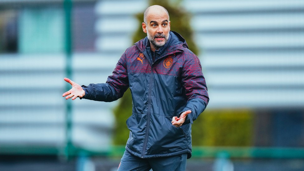 THE BOSS  : Pep Guardiola shows his players the way at the CFA.