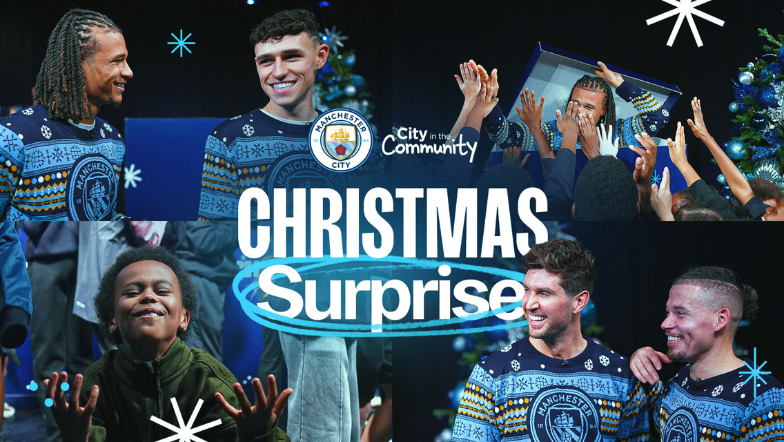 Collage of people wearing Manchester City Christmas sweaters, with a Christmas tree and gifts, under 'Christmas Surprise' text. Manchester City and 'City in the Community' logos are visible.