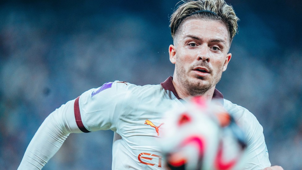 EYES ON THE PRIZE : Jack Grealish chases the ball in our semi-final clash.
