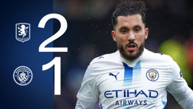 Football match result graphic with Aston Villa and Manchester City logos, showing a 2-1 victory for Aston Villa. A player in a Manchester City kit is prominently featured.