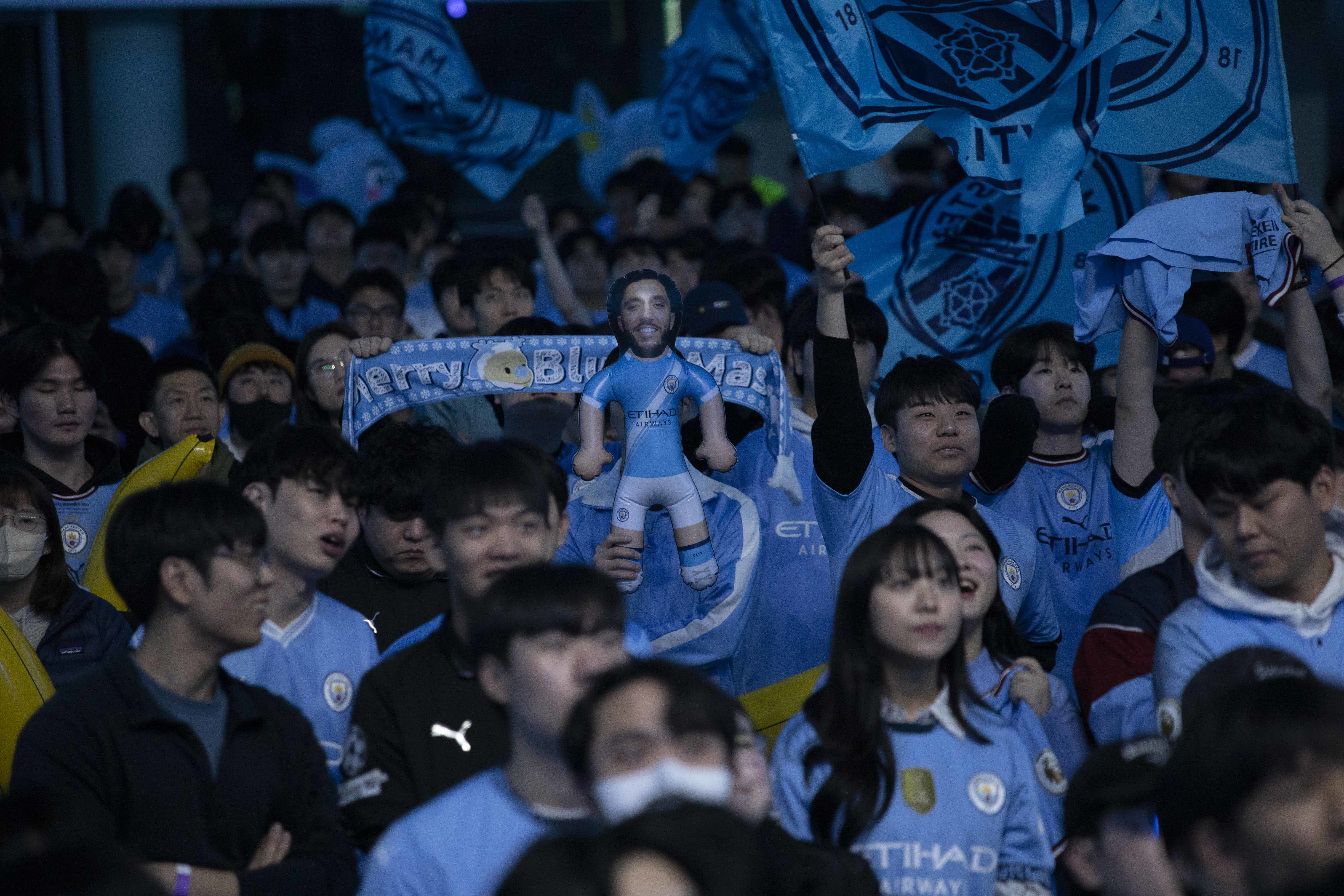 Hundreds of fans celebrate in Seoul as part of the club's first