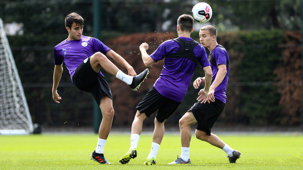 HIGH BALL : Eric Garcia lifts a pass skywards....