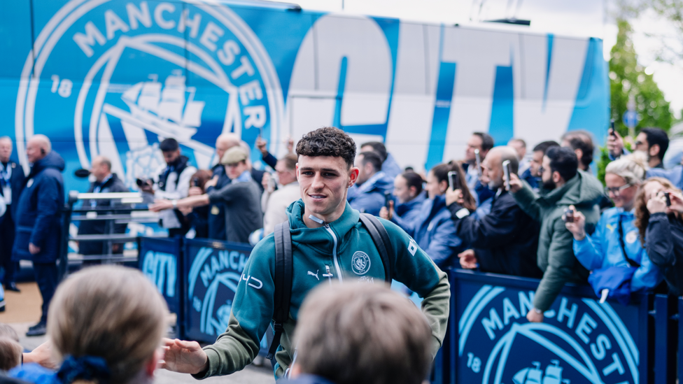 PHIL-ING GOOD : Foden greets fans after being named in the starting XI.