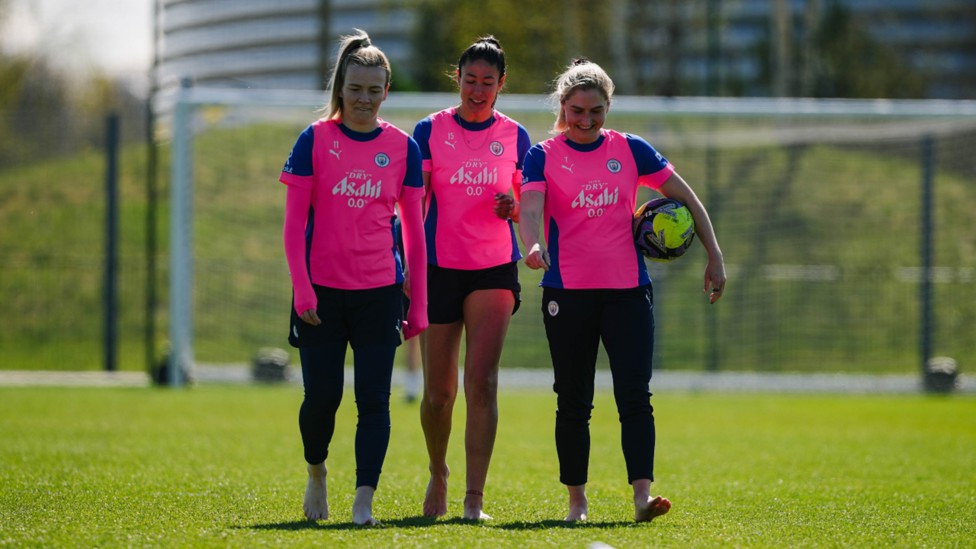 TRUE BLUES: Lauren Hemp, Leila Ouahabi and Laura Coombs await the next drill.