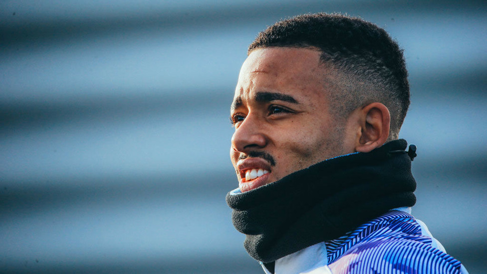 WRAPPED UP : Jesus grimaces in the cold ahead of training.