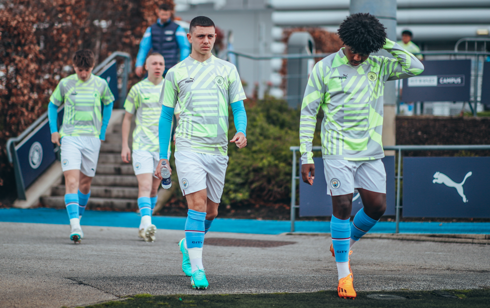 IN THE ZONE: The players walk to the field of play before their pre-match drills. 