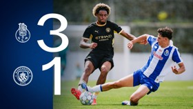 FC Porto won 3-1 against Manchester City in a football match. The image shows players from both teams competing for the ball on the field.