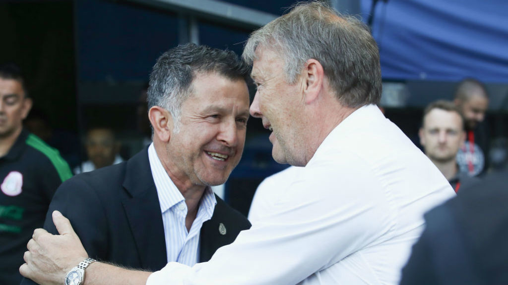 BLUE REUNION : Age Hareide greets Paraguay boss Juan Carlos Osorio, who spent five years in City's backroom staff