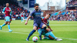 SILKY ILKAY: Gundogan retains possession.