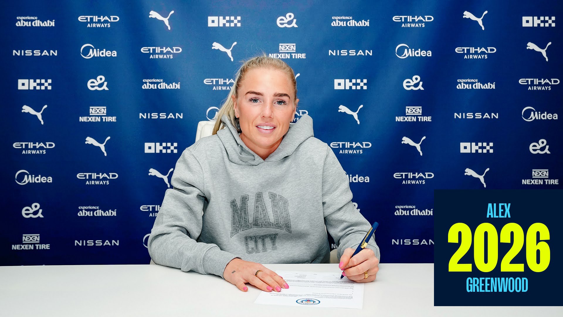 SIGN ON THE DOTTED LINE : Alex Greenwood pledges her future to City.