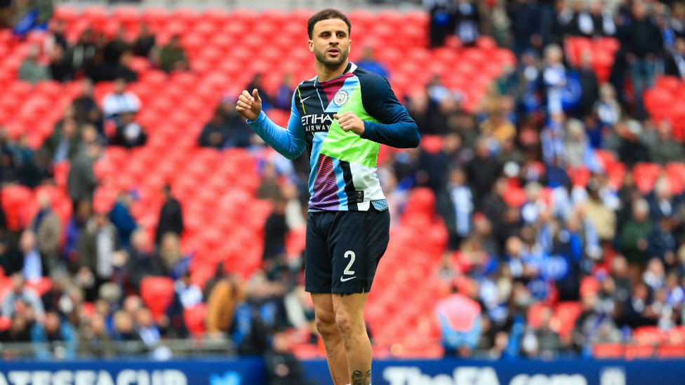 JUMPING FOR JOY : Kyle Walker warms up ahead of FA Cup semi final in celebratory Nike jersey.