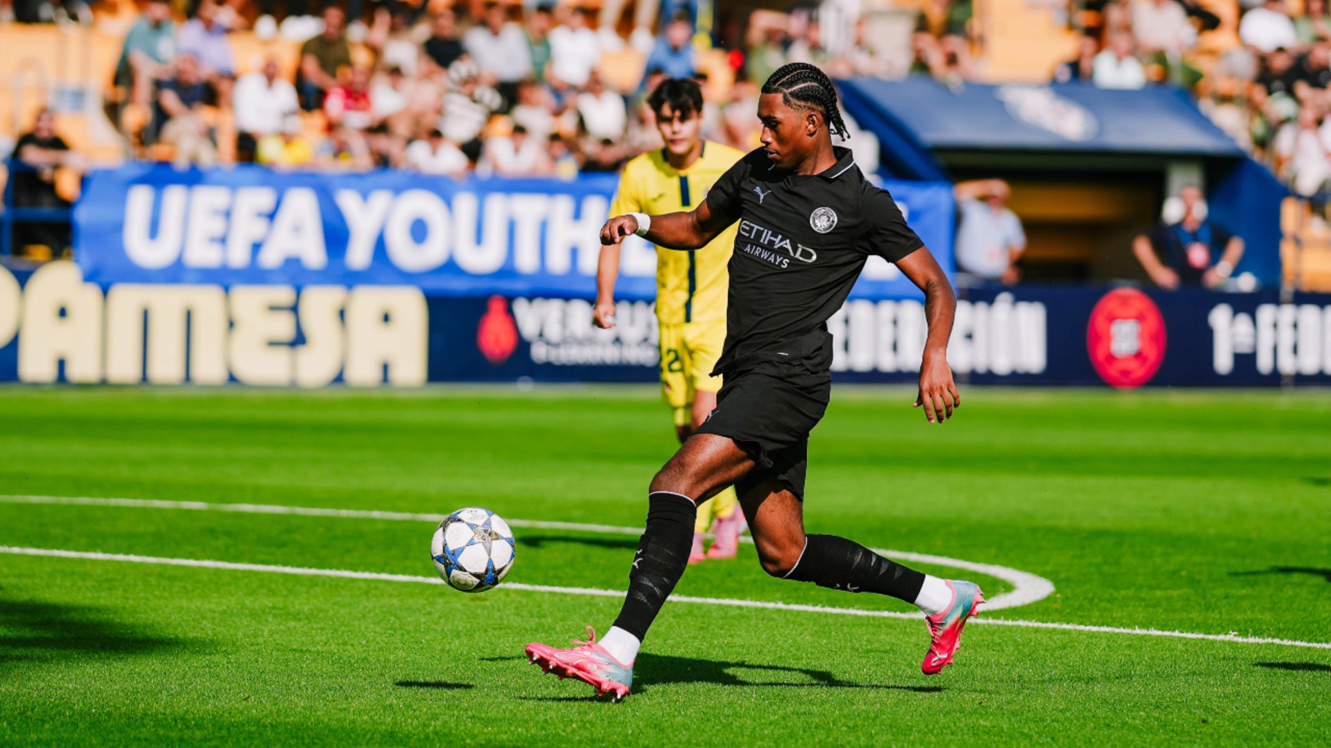 FIGHTING : Reigan Heskey helps City push for a way back into the game.