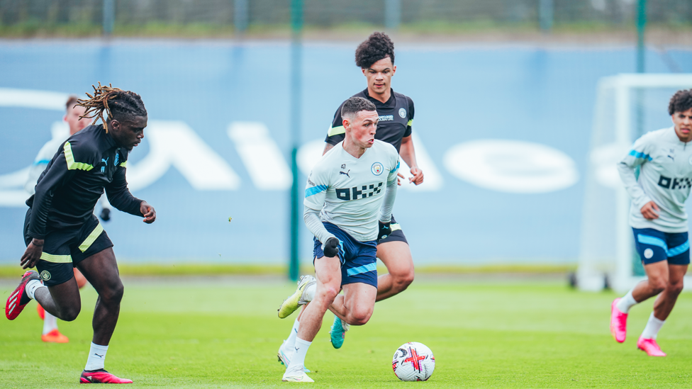 PHIL GETS FORWARD : Foden runs at the defence