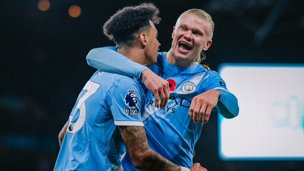 ALL SMILES : Haaland celebrates with O'Reilly.