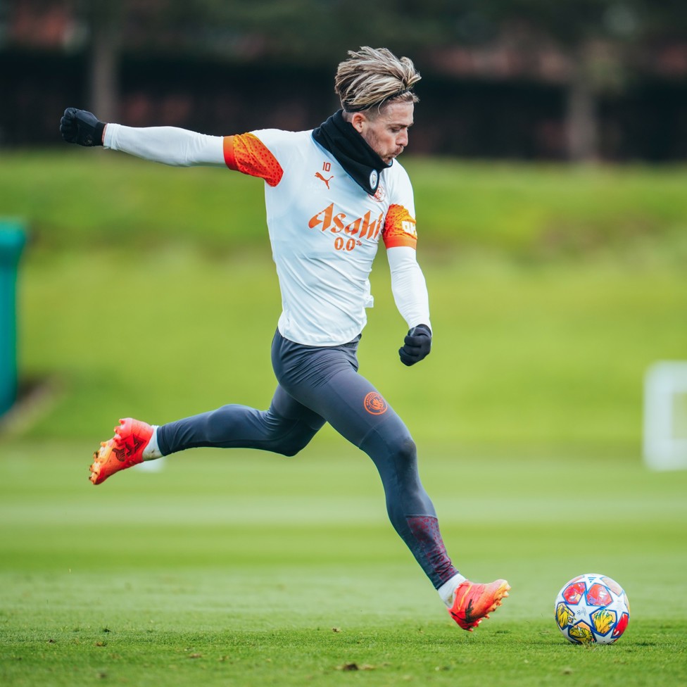 STRIKE : Jack Grealish puts his foot through the ball
