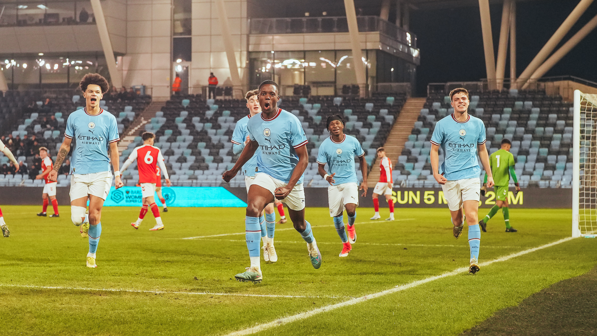 CELEBRATION TIME: Justin Oboavwoduo and his team mates are all smiles after City's opener.