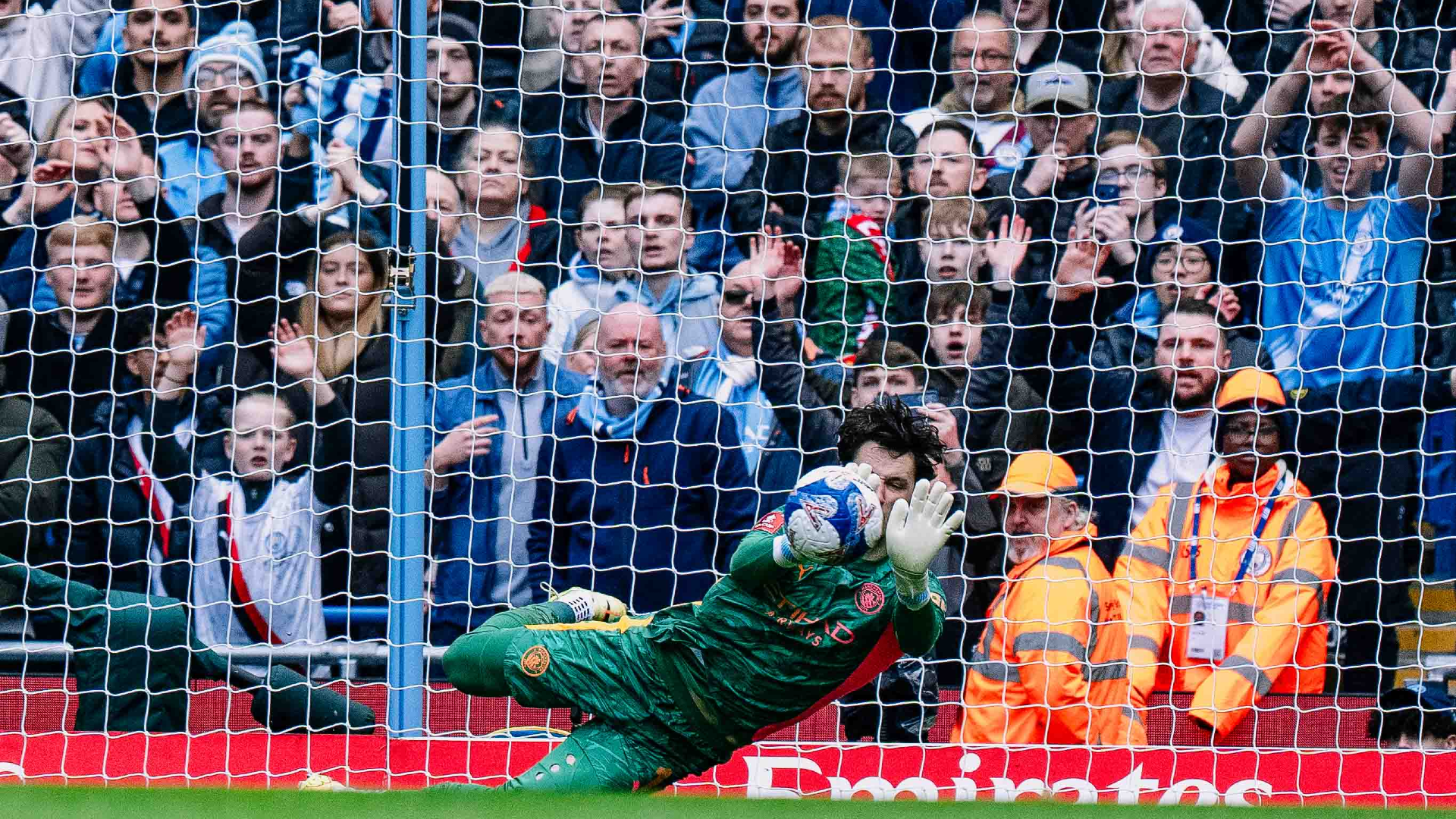 GLOVE STORY: James Trafford saves Mohamed Salah's penalty.