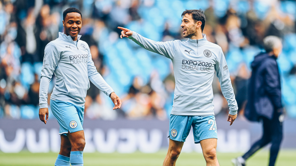 ALL SMILES : Bernardo and Sterling in good spirits during the pre-match warm up.
