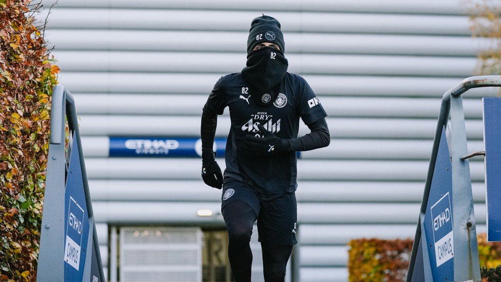 WRAPPED UP : Rico Lewis keeping warm