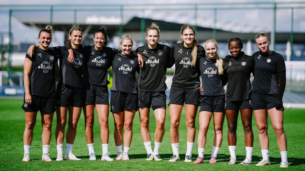 WINNERS : The triumphant team smiles for the camera.