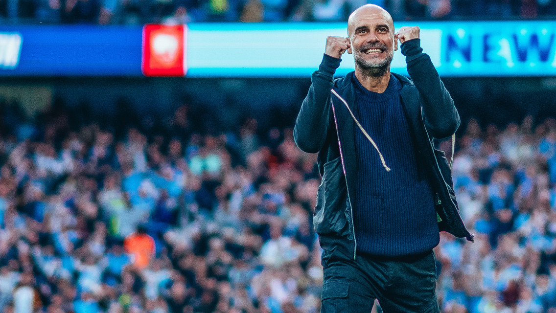THE BOSS: Celebrates on the touchline.