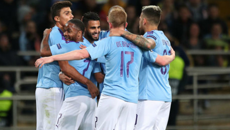 CENTRE OF ATTENTION: Riyad Mahrez is mobbed by his team-mates after his first half goal